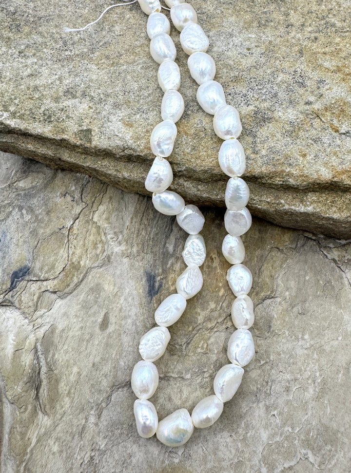 Fresh Water Baroque Irridecent White Large Hole Pearls 8x12mm irregular shape, 15.5 inch Strand