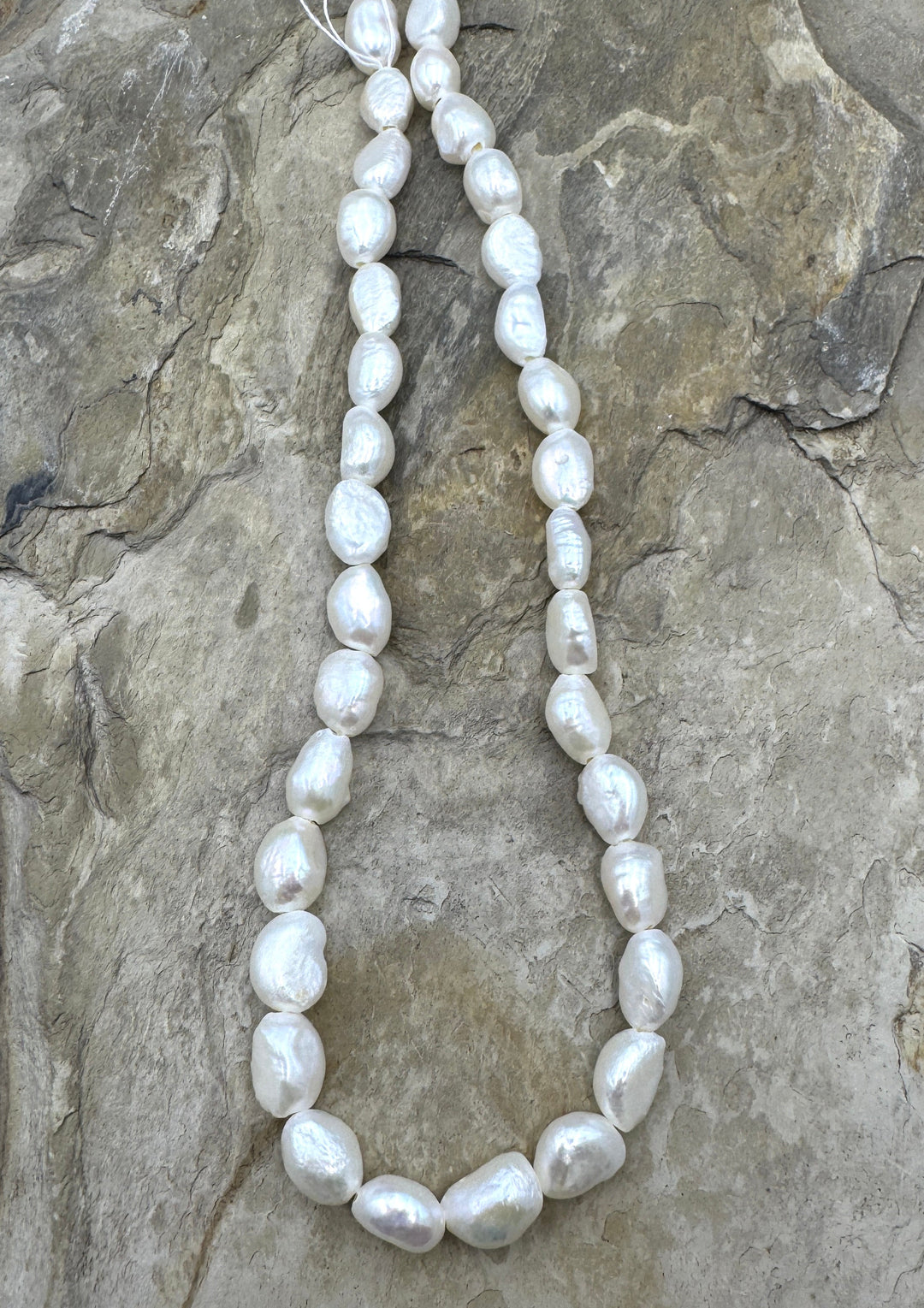 Fresh Water Baroque Irridecent White Large Hole Pearls 8x12mm irregular shape, 15.5 inch Strand