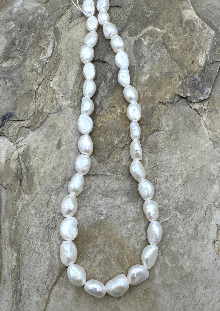Fresh Water Baroque Irridecent White Large Hole Pearls 8x12mm irregular shape, 15.5 inch Strand
