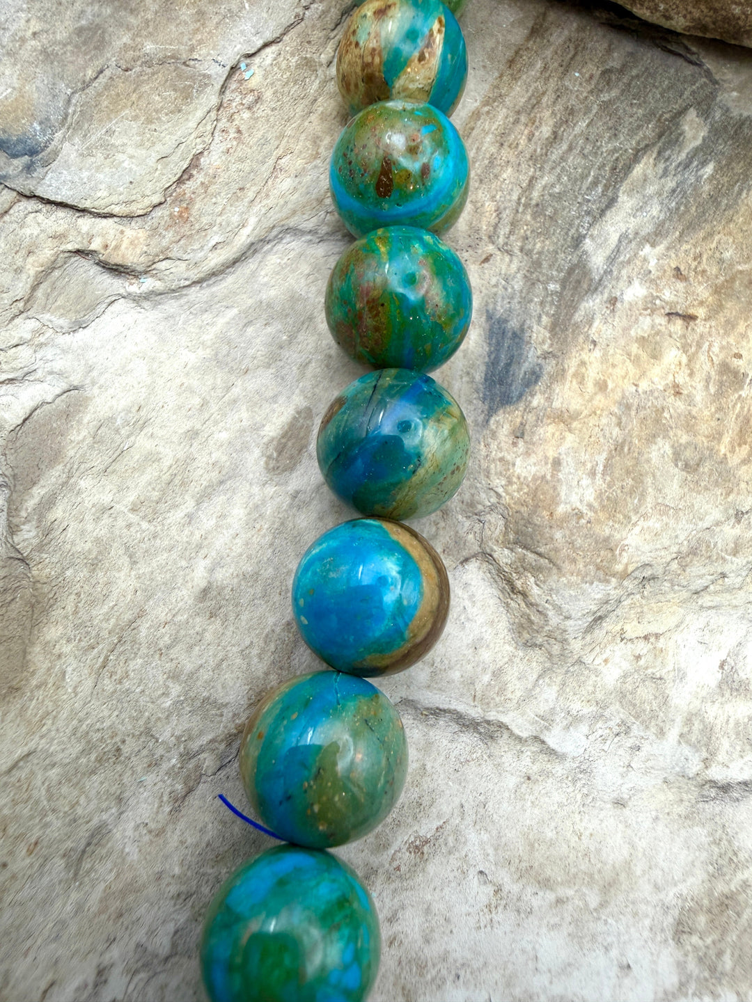 AAA+ Peruvian Blue Opal 11.5mm Round Beads 8 Inch Strand/18