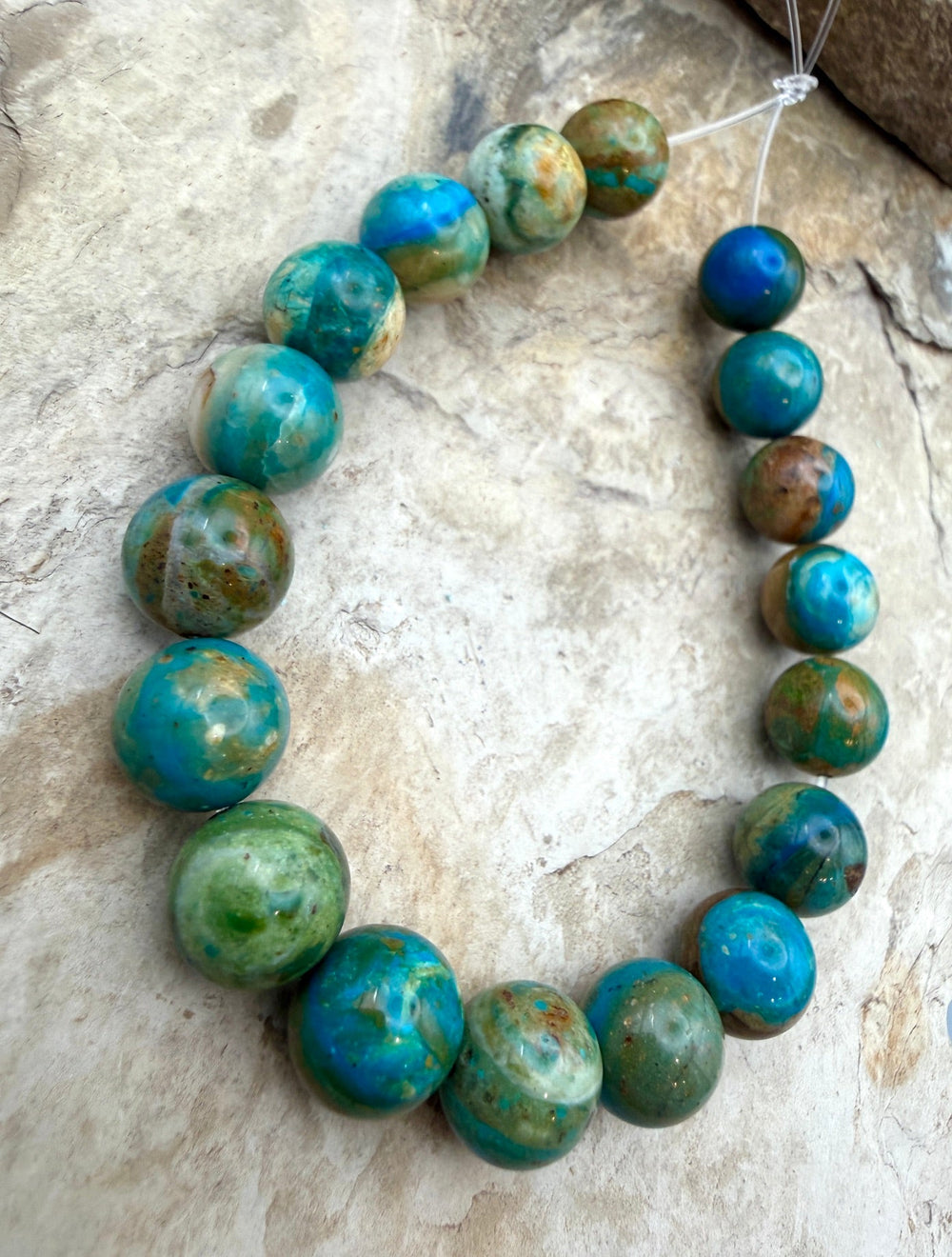 AAA+ Peruvian Blue Opal 11.5-12mm Round Beads 8 Inch