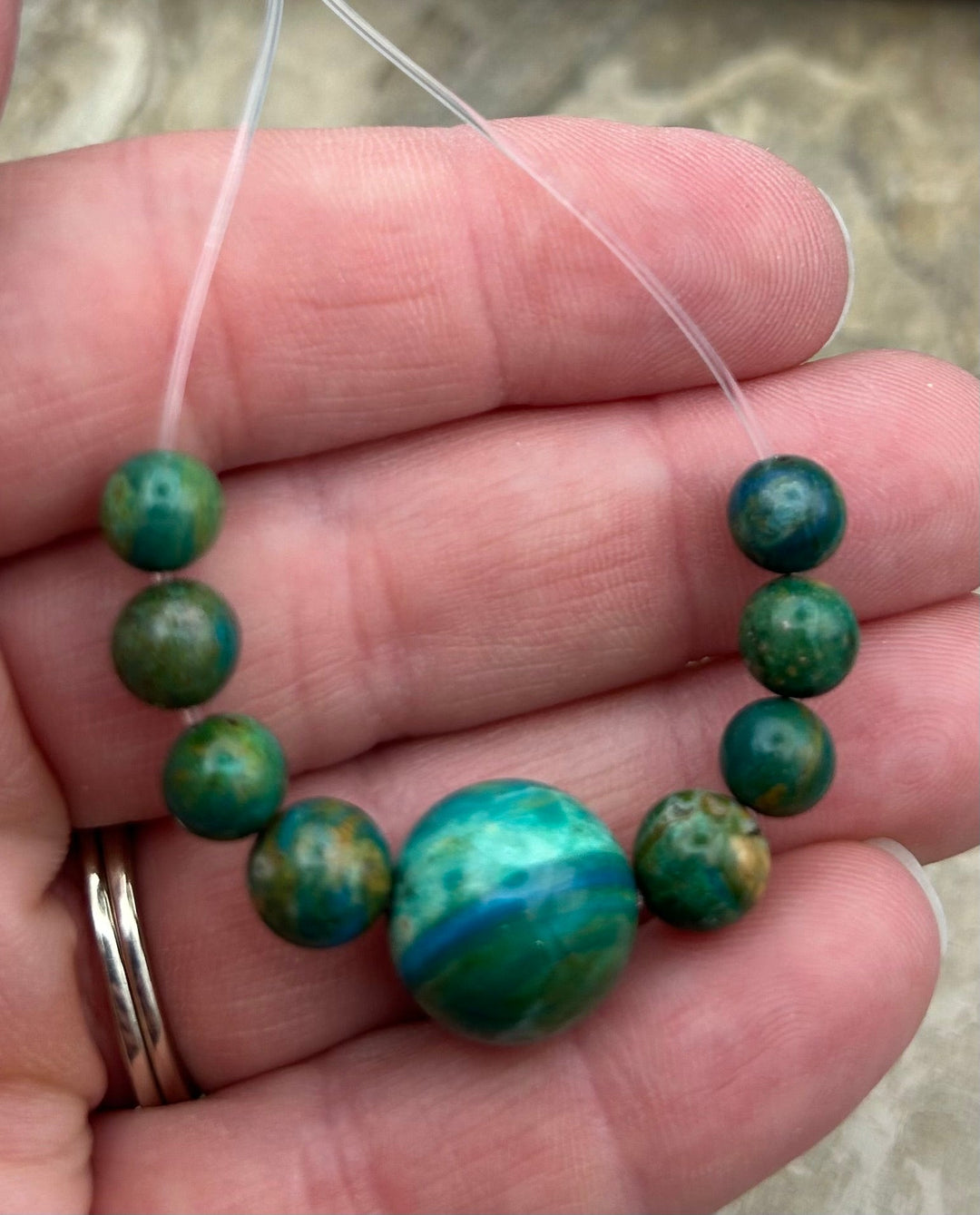 AAA+ Peruvian Blue Opal 7-13.5mm Round Beads Focal Strand/9