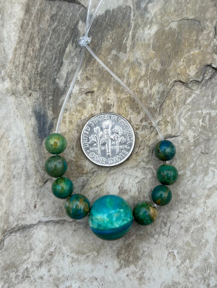 AAA+ Peruvian Blue Opal 7-13.5mm Round Beads Focal Strand/9