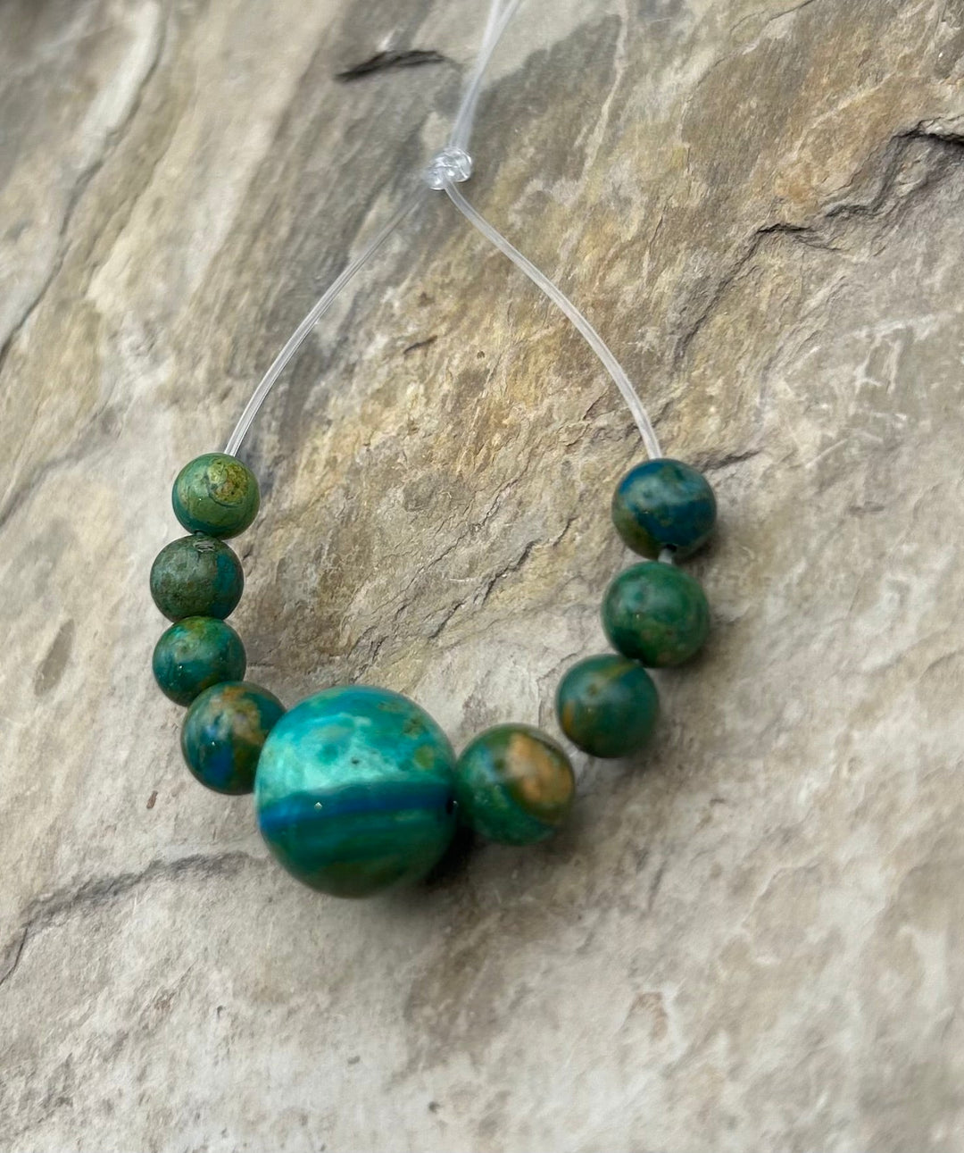 AAA+ Peruvian Blue Opal 7-13.5mm Round Beads Focal Strand/9