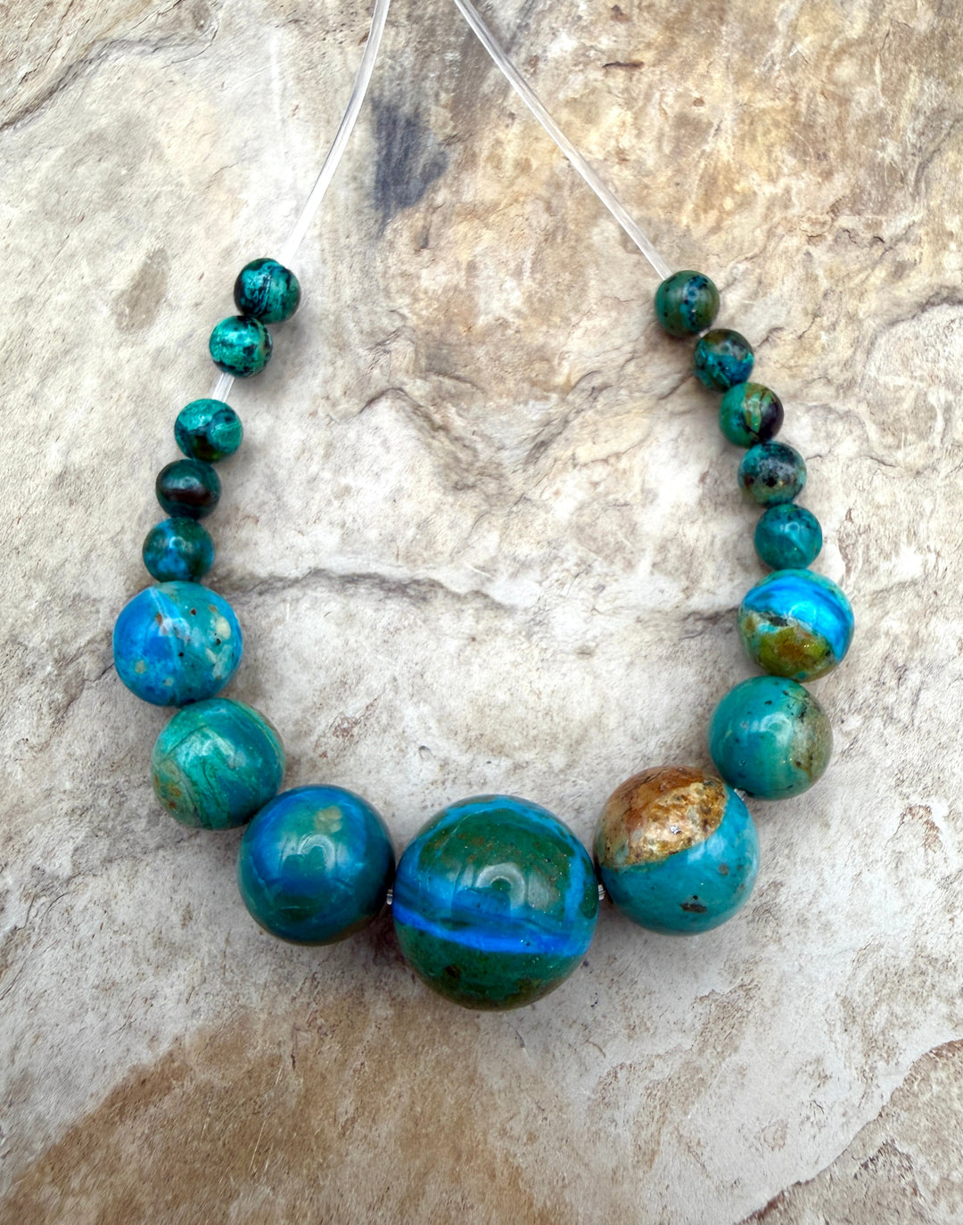AAA+ Peruvian Blue Opal Graduated Round Bead Focal Strand 4