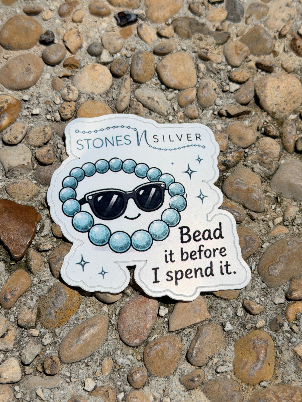 ’Bead it before I spend it.’ Sticker 2.5 inches - merch