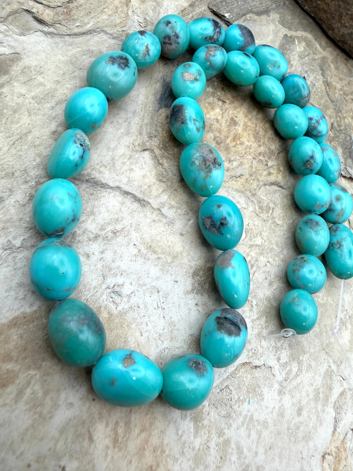 Campitos Turquoise (Mexico) with Pyrite Smooth Oval Nugget