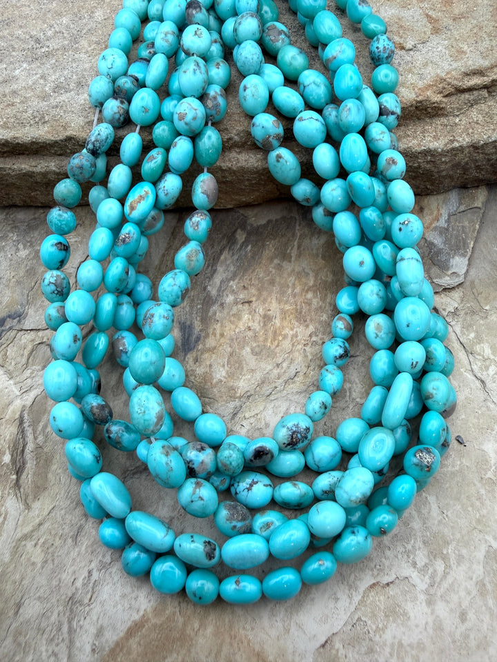 Campitos Turquoise (Mexico) with Pyrite Smooth Oval Nugget