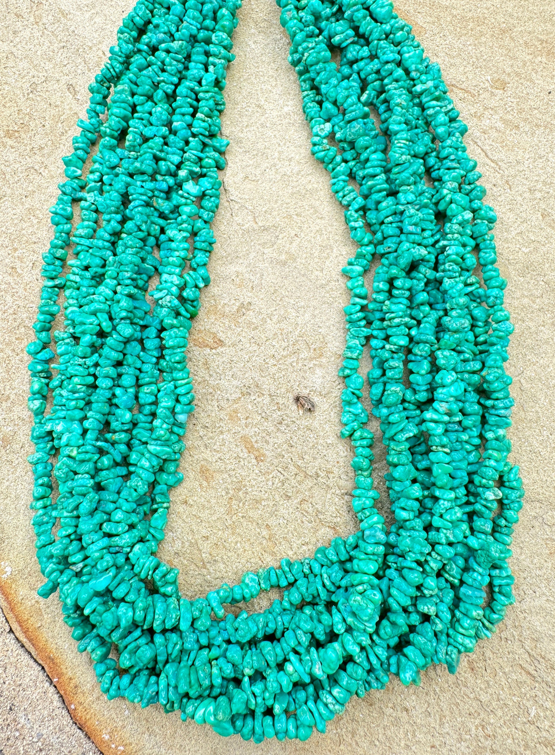 Emerald Valley (NV) Turquoise 4-5mm Chips 16 Inch Strand