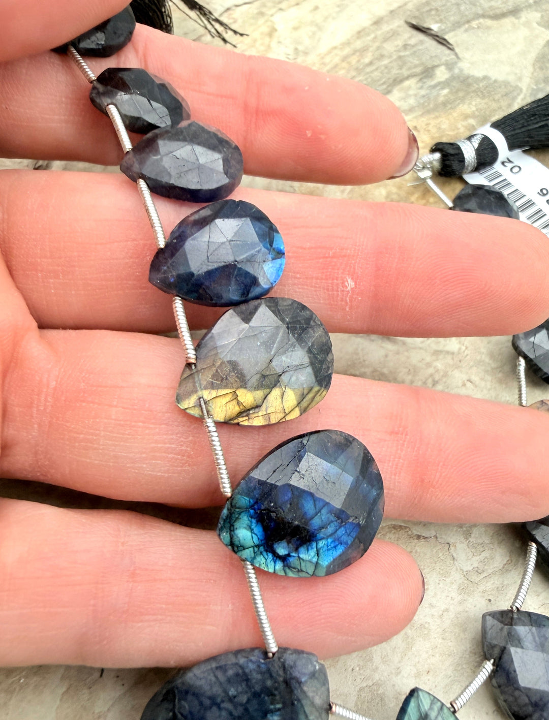Flashy Black Labradorite Graduated Teardrop Briolette Beads