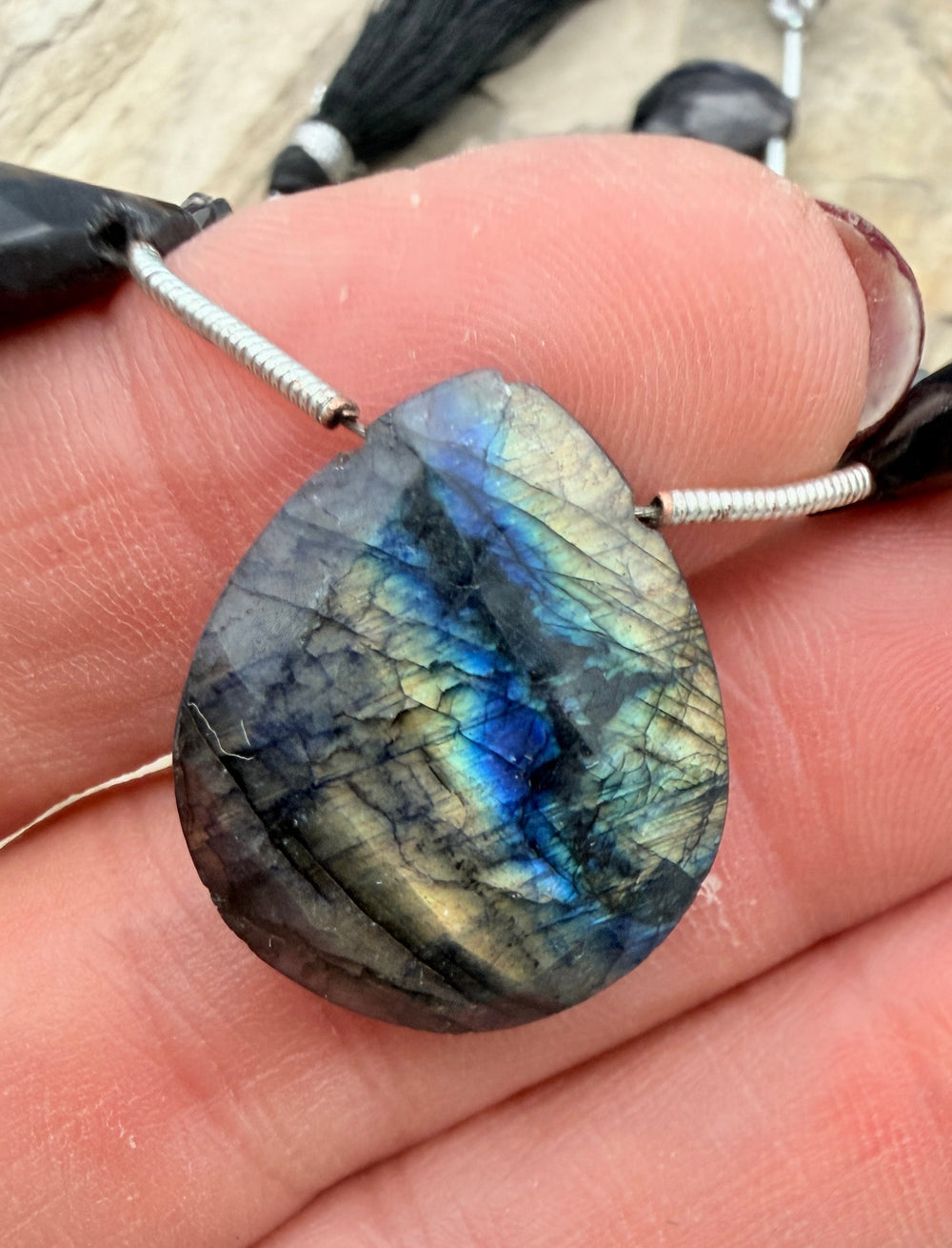 Flashy Black Labradorite Graduated Teardrop Briolette Beads