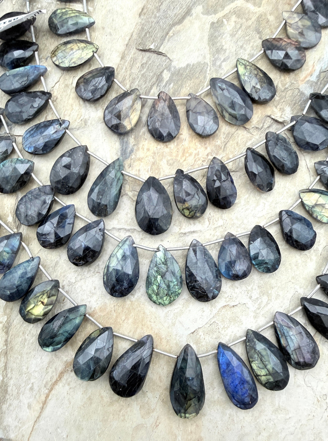 Flashy Black Labradorite Graduated Teardrop Briolette Beads