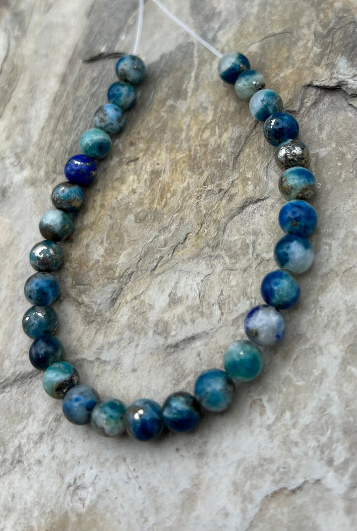 High Grade Hackmanite (Afghanistan) 7mm Round Beads 7 Inch