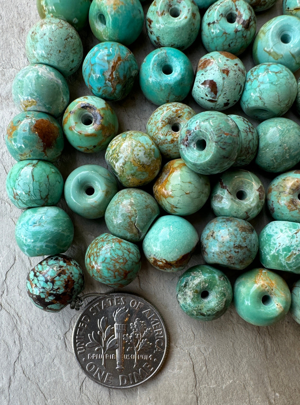 Hubei Turquoise (China) 10x8mm Drum Shaped Beads (Package