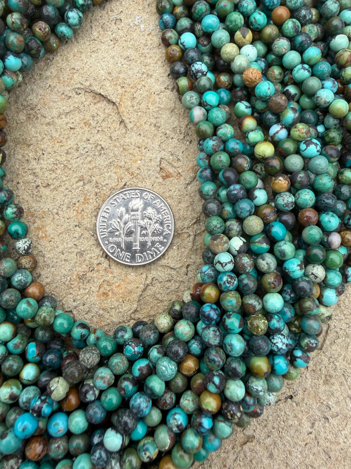 Hubei Turquoise (China) 4mm Round Beads 15 Inch Strand