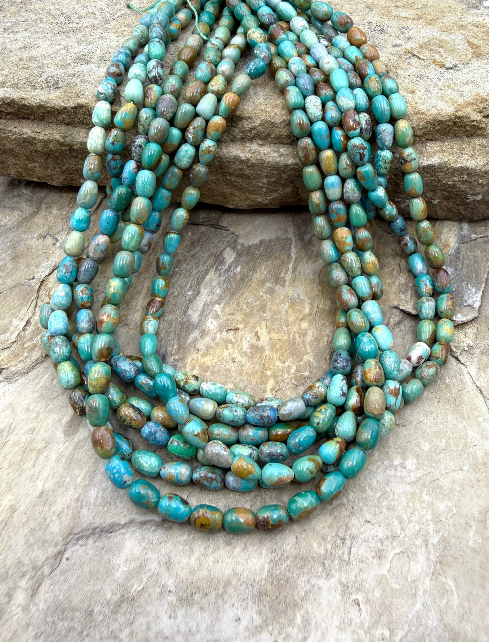 Hubei Turquoise (China) 4x6mm Rice Beads 16 Inch Strand