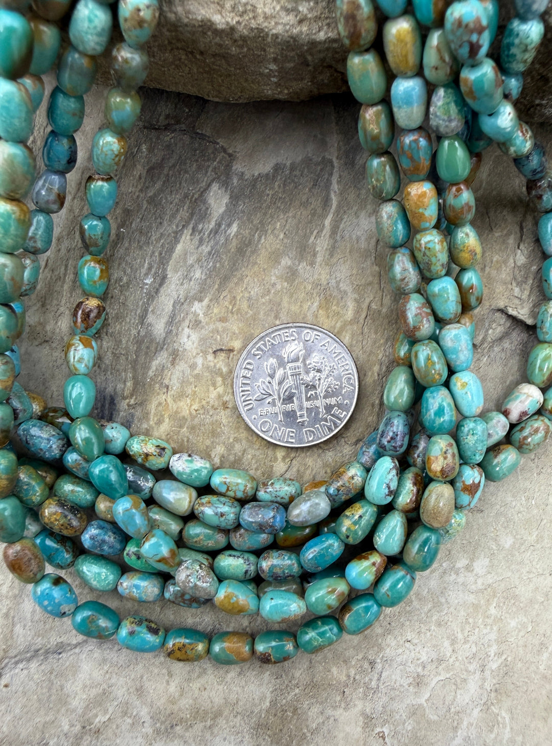 Hubei Turquoise (China) 4x6mm Rice Beads 16 Inch Strand
