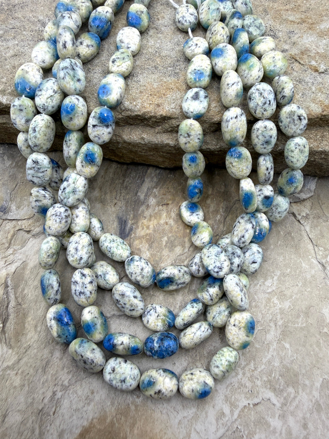 K2 Blue Jasper (Pakistan) Oval Beads 8x10-8x12mm 13 Inch