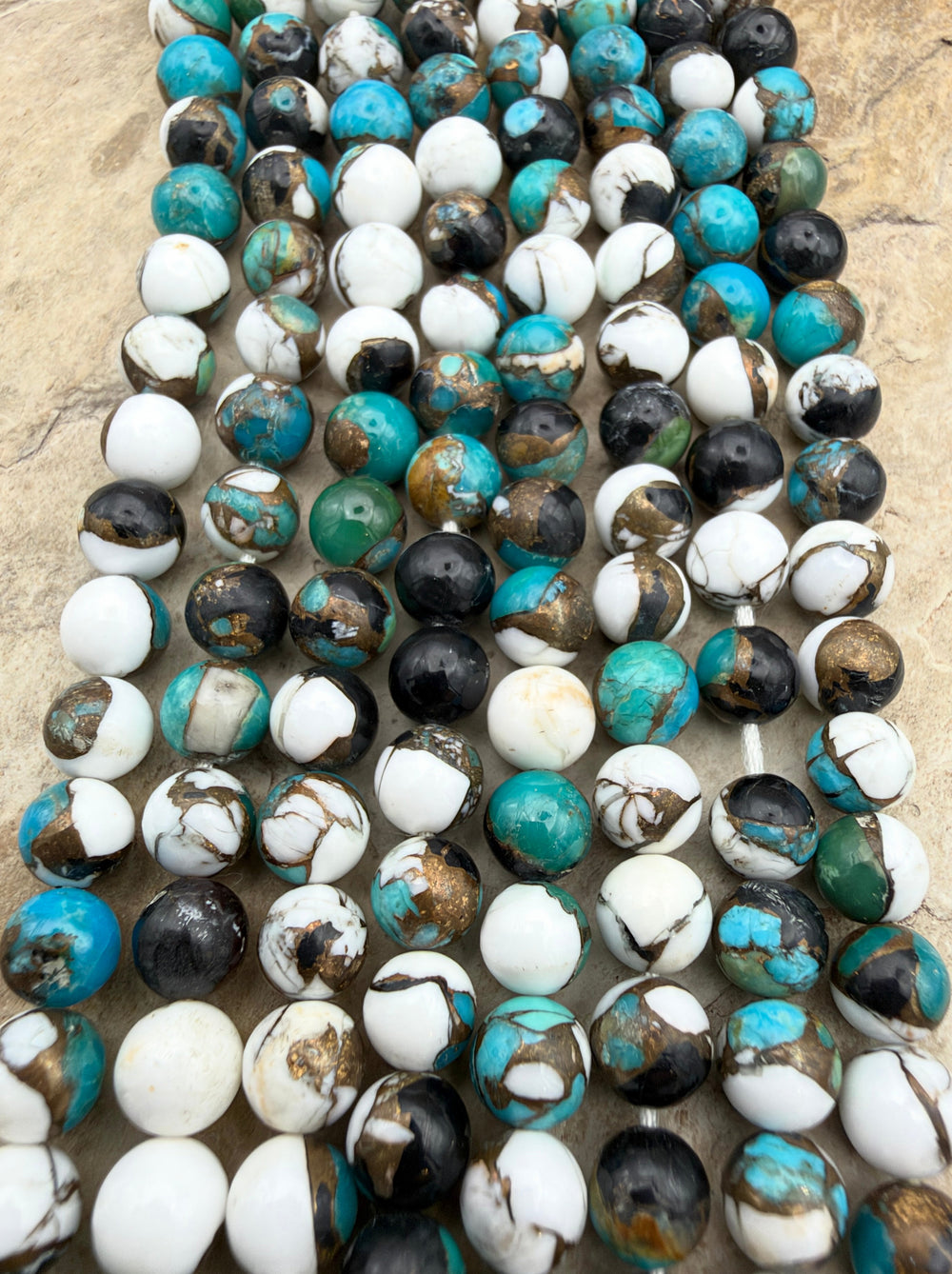 Kingman Turquoise and White Buffalo with Bronze Composite