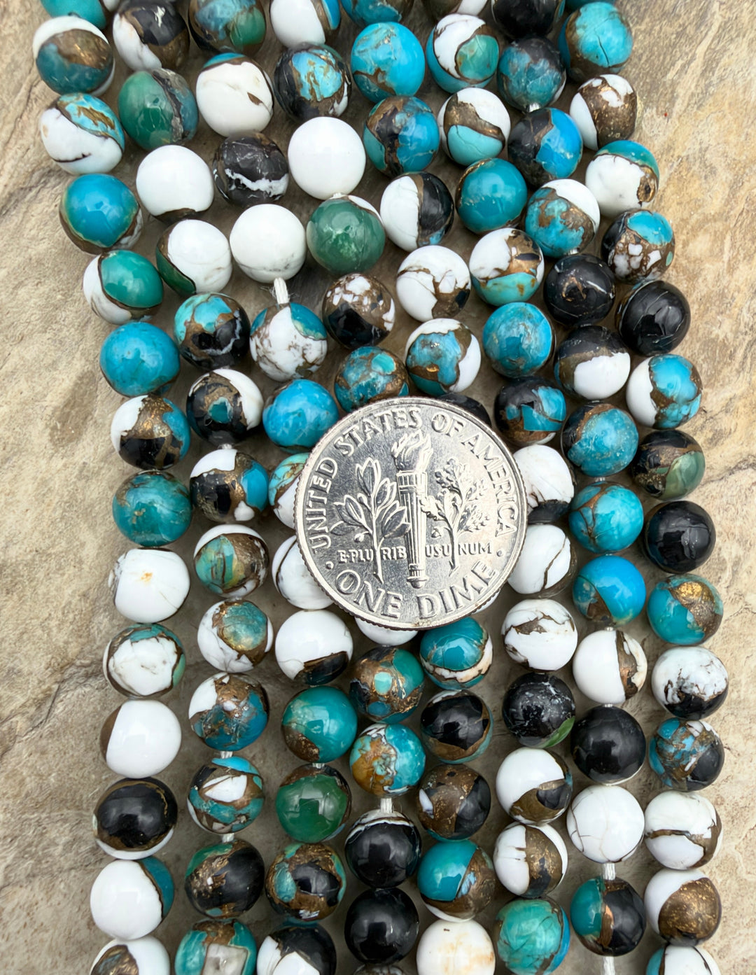 Kingman Turquoise and White Buffalo with Bronze Composite