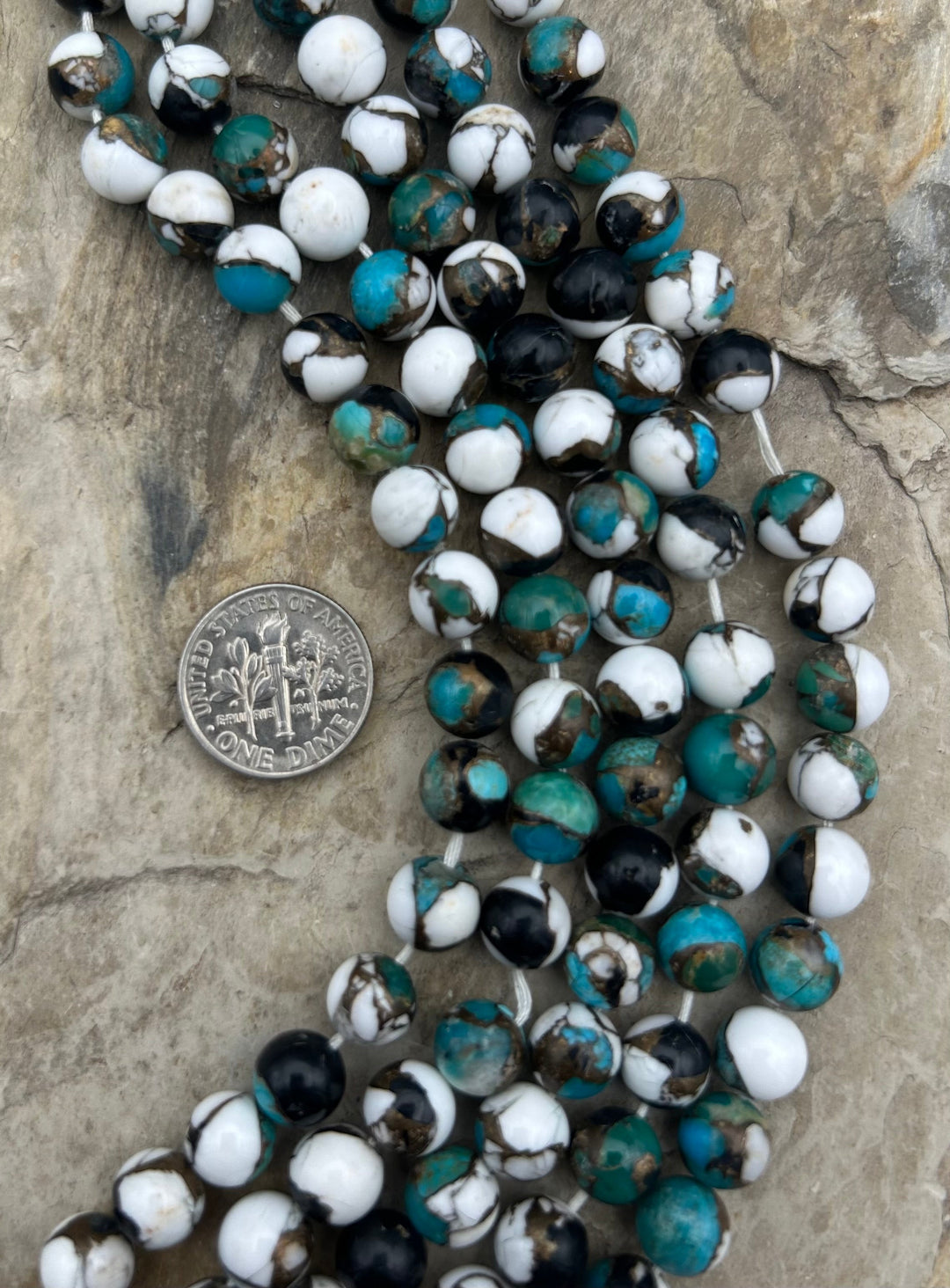 Kingman Turquoise and White Buffalo with Bronze Composite
