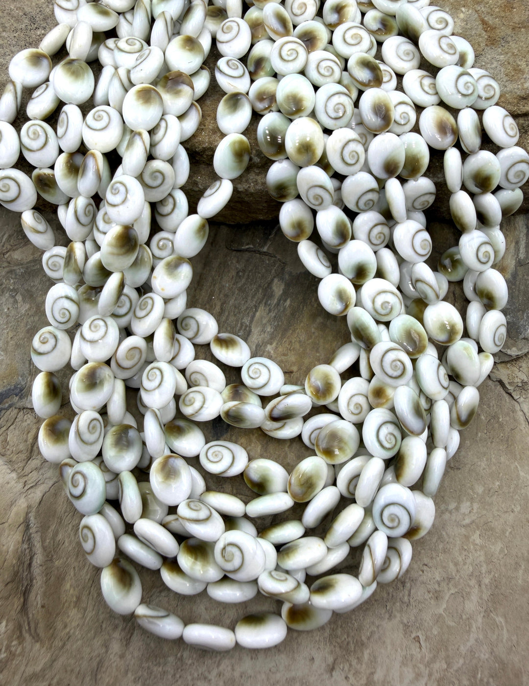 Natural Center Cut Shiva Shell Oval Beads 8x10mm 16 Inch