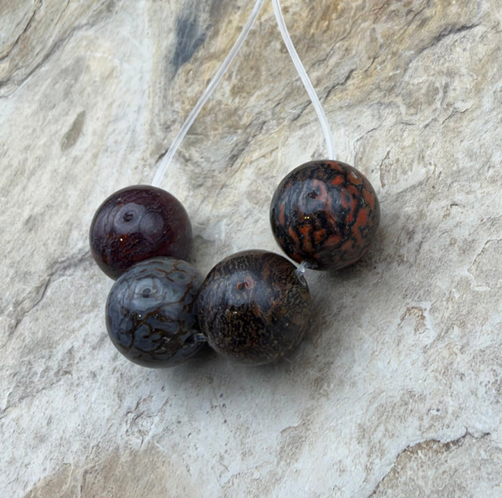 RARE AAA+ High Pattern Utah Dinosaur Bone 12mm Round Beads