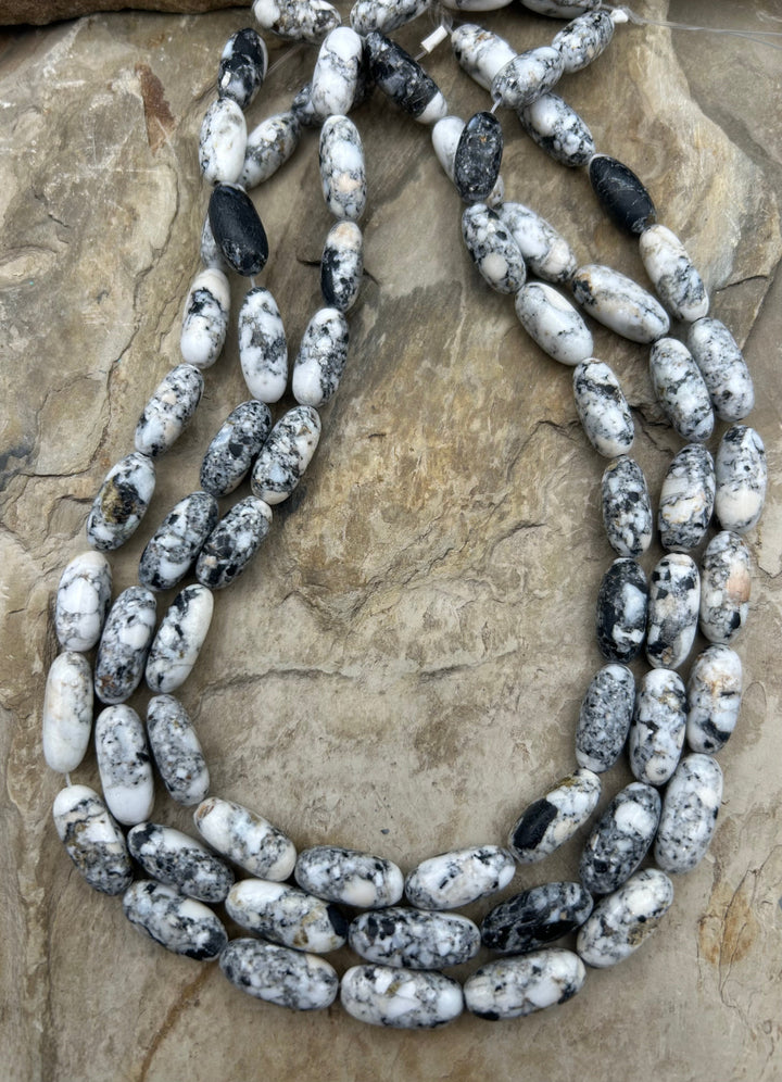 RARE High Quality White Buffalo (Nevada) Hand cut Oval Tube
