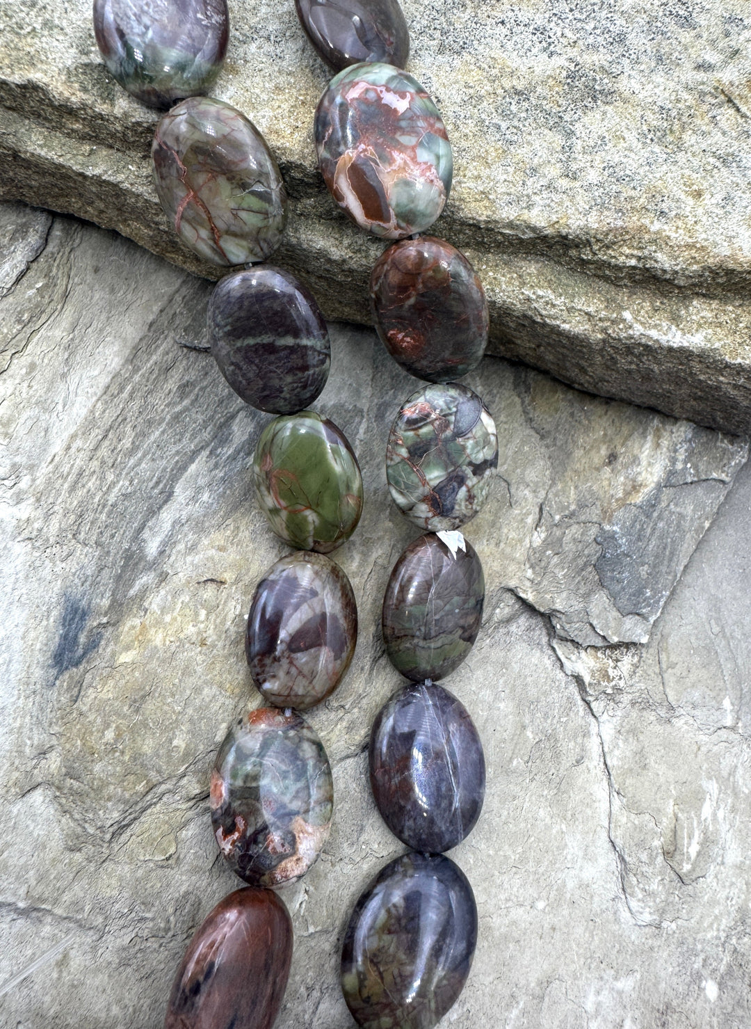 Rhyolite Flat Oval 15x20mm Bead Strand 16 Inch Strand - Red