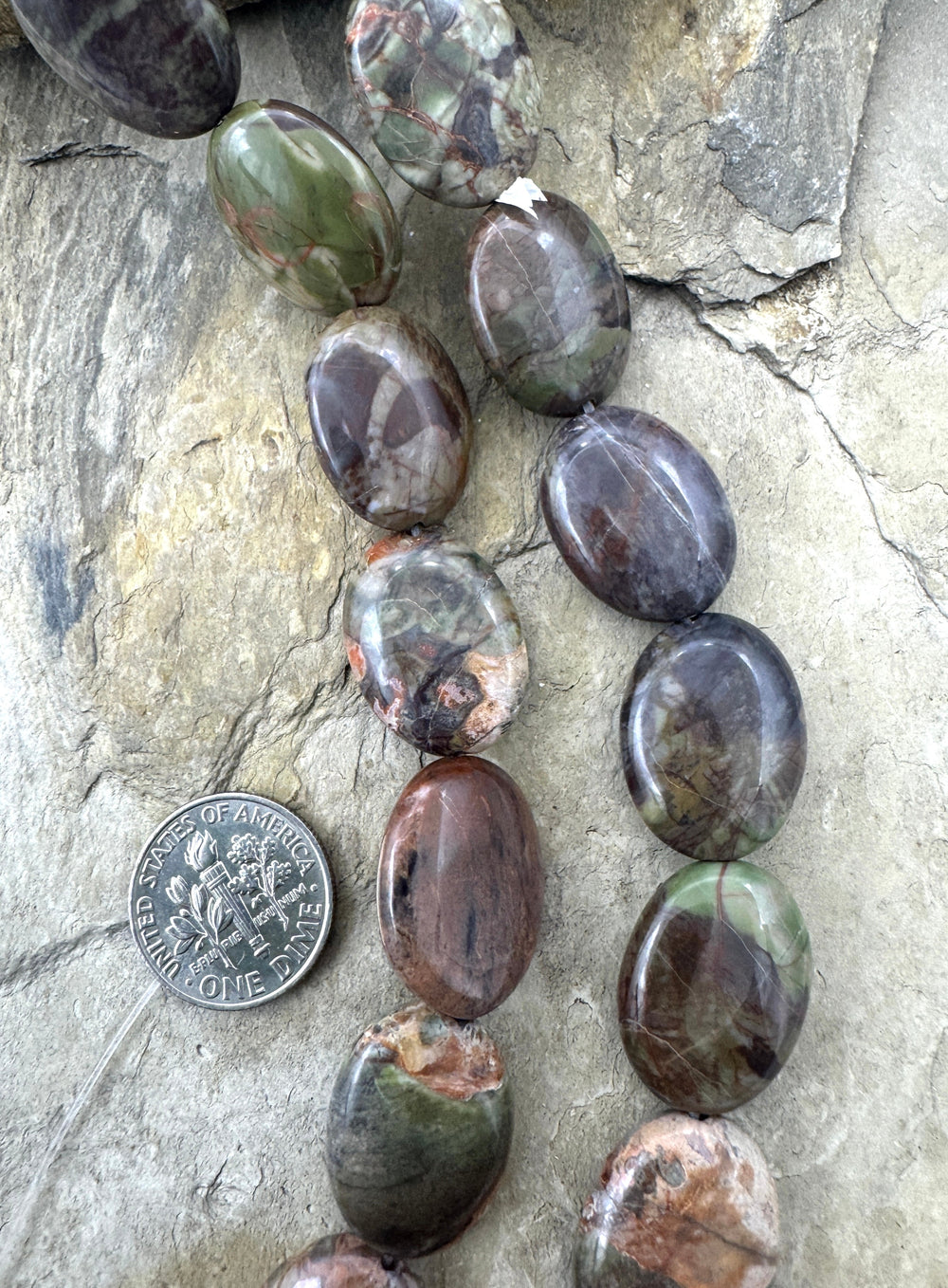 Rhyolite Flat Oval 15x20mm Bead Strand 16 Inch Strand - Red