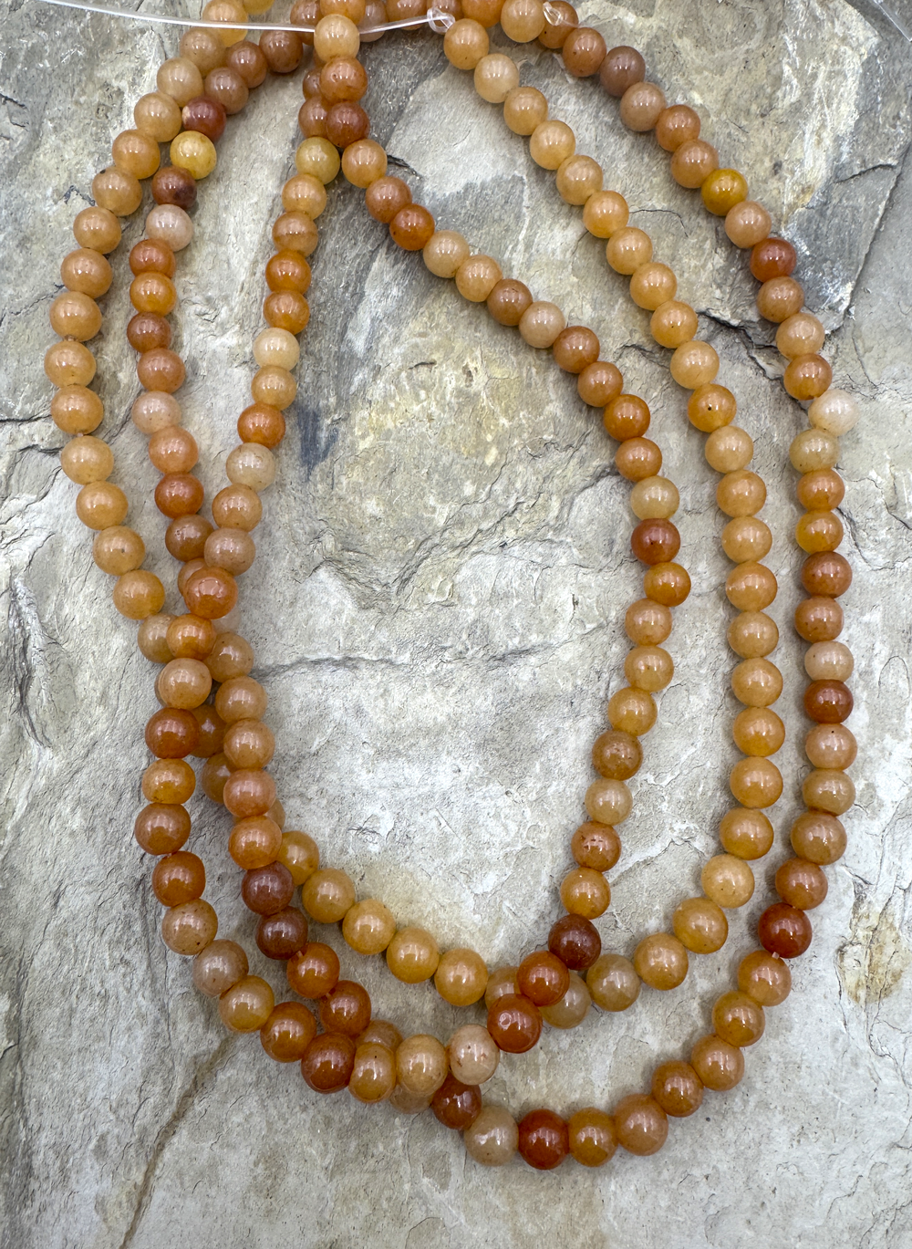Sunstone (Canada) 7mm Round Beads 15.5 Inch Strand Sunstone