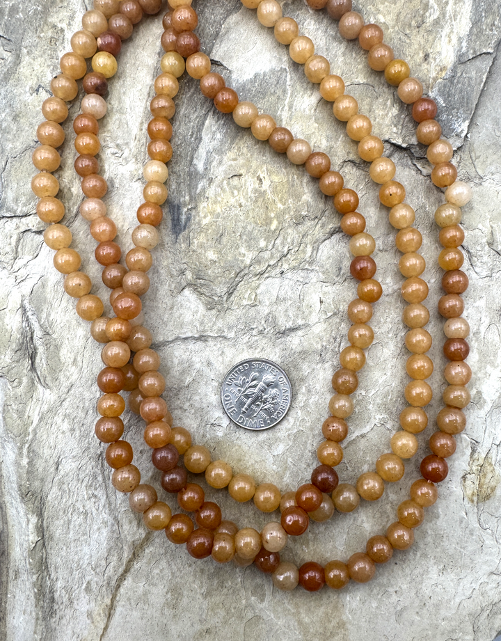 Sunstone (Canada) 7mm Round Beads 15.5 Inch Strand Sunstone