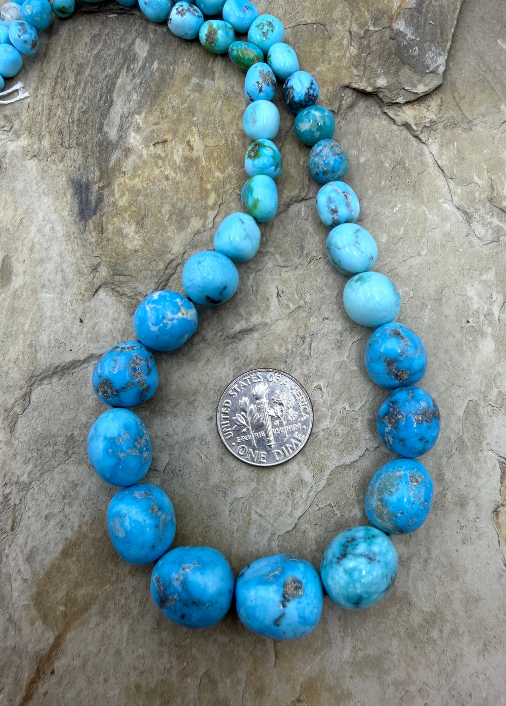 White water Turquoise (Mexico) with Pyrite Graduated